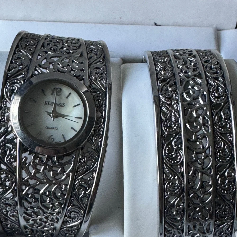 Kessaris Womens Silver Tone Filigree Cuff Watch and Matching Bangle Bracelet Set